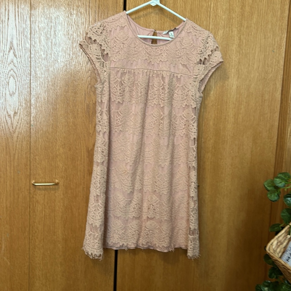 The color is light pink or some wouldd say a light coral color.